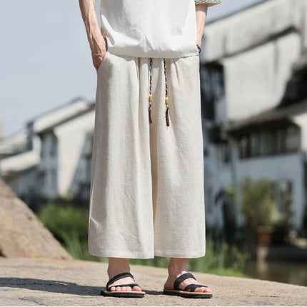 Pantaloncini larghi da uomo Pantaloni casual traspiranti estivi Gamba larga in cotone di lino Taglie forti 5XL Pantaloni Harajuku comodi da esterno da uomo