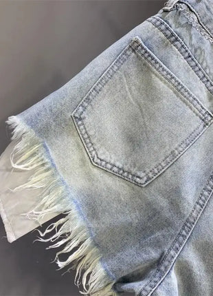 Nuovo stile di pantaloncini di jeans strappati con tasche lavate sfilacciate e piedi larghi