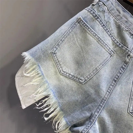 New style ripped denim shorts with frayed washed pockets and wide legs