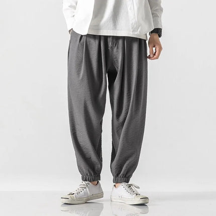 Pantaloni Harem in cotone e lino Pantaloni estivi larghi in tinta unita stile giapponese Pantaloni leggeri comodi e traspiranti casual da uomo