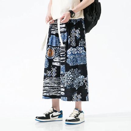 Pantaloncini da uomo estivi Stampa Pantaloni da spiaggia traspiranti a gamba larga Pantaloni larghi casual alla moda Vita elastica Comodi pantaloni al polpaccio da uomo