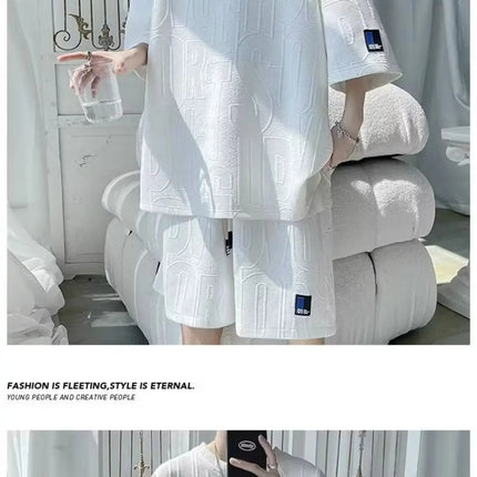 Abito di moda maschile bello set con pantaloncini a maniche corte jacquard sportivi casual larghi Set da due pezzi 2025 Primavera ed estate platinumshop
