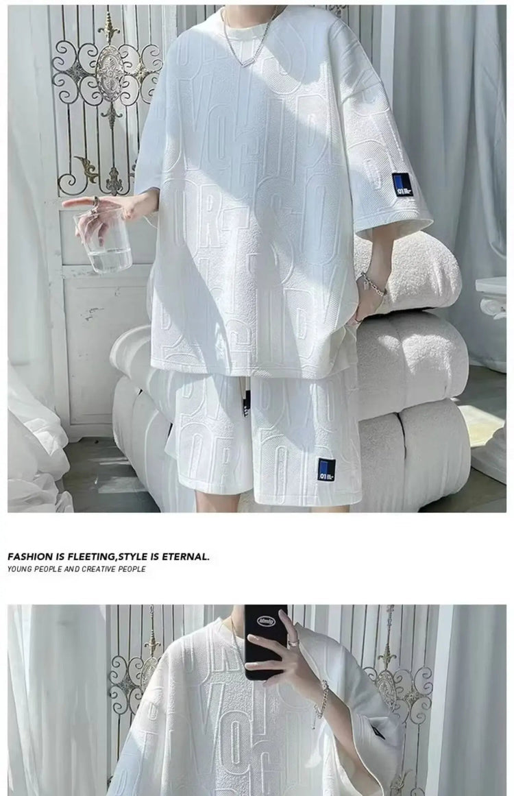 Abito di moda maschile bello set con pantaloncini a maniche corte jacquard sportivi casual larghi Set da due pezzi 2025 Primavera ed estate platinumshop