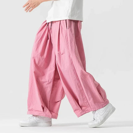 Pantaloni cargo da uomo Pantaloni casual stile giapponese Harajuku Moda allentata maschile Harem Pantaloni a gamba larga in vita elastica Uomo Nuovo streetwear