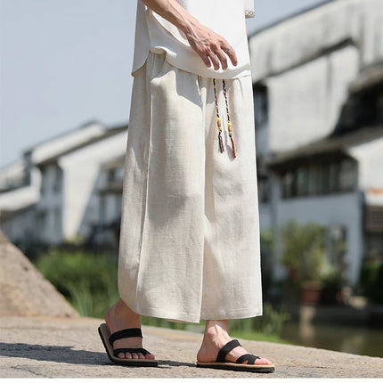 Pantaloncini larghi da uomo Pantaloni casual traspiranti estivi Gamba larga in cotone di lino Taglie forti 5XL Pantaloni Harajuku comodi da esterno da uomo