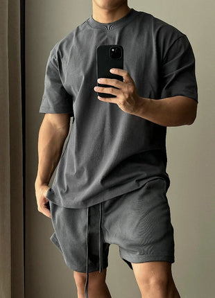 Set di pantaloncini a maniche corte in puro cotone da uomo, t-shirt sportiva e per il tempo libero allentata alla moda europea e americana platinumshop