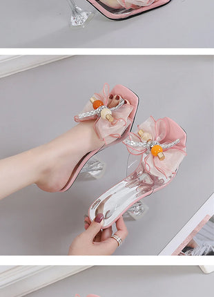 Liyke 2026 Nouvelle Mode 9CM Pantoufles à Talon Transparent Fil Net Rose Nœud Papillon Sandales d'Été Chaussures Transparentes pour Femmes Claquettes Présentations des entreprises productrices de jeux