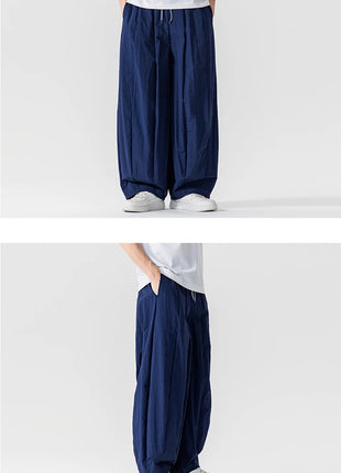 Pantaloni Uomo Nuova Estate Pantaloni larghi leggeri e sottili in vita elastica Sport all'aria aperta maschili Pantaloni larghi casual oversize da uomo Streetwear