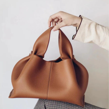 Mini borsa a mano in pelle martellata, manico con fibbia e chiusura metallica, tracolla rimovibile per uso quotidiano