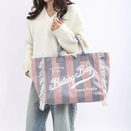 Borsa tote a righe da donna con colori contrastanti Borsa a tracolla con lettere alla moda Borsa da pendolarismo per ascelle di grande capacità