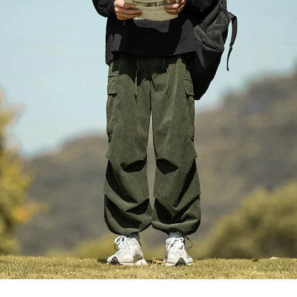 2025 autumn and winter new retro brown corduroy multi pocket workwear pants for men, loose drawstring elastic waist pants