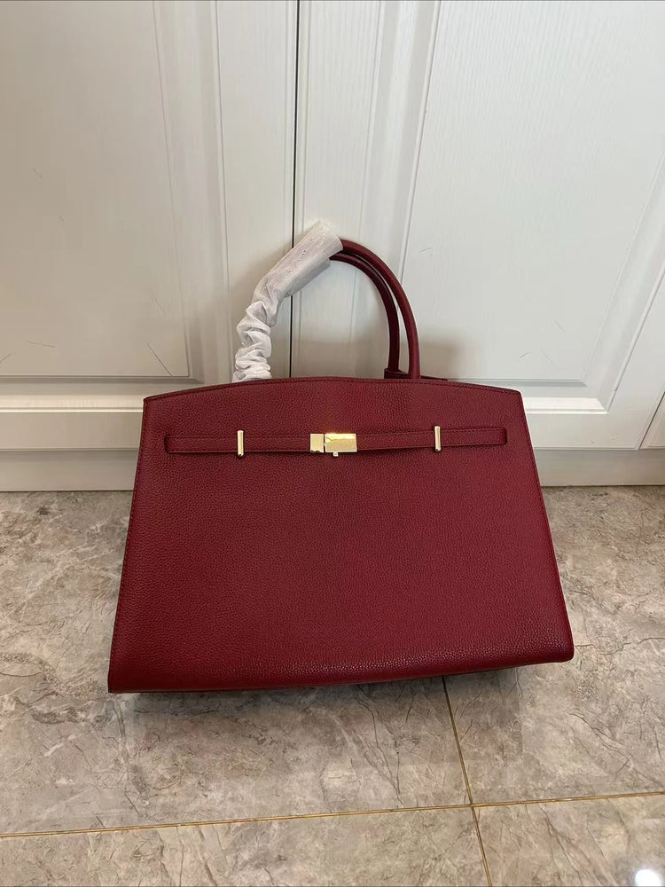 Borsa a mano di lusso in pelle martellata con chiusura in metallo, manico rigido, borsa professionale per affari e cerimonie