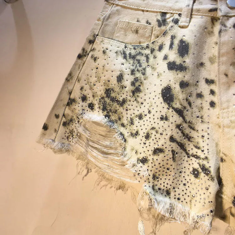 2025 Abiti estivi, Nuovi pantaloncini di jeans con bordo ruvido indossato a vita alta con perforazio
