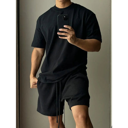 Set di pantaloncini a maniche corte in puro cotone da uomo, t-shirt sportiva e per il tempo libero allentata alla moda europea e americana platinumshop