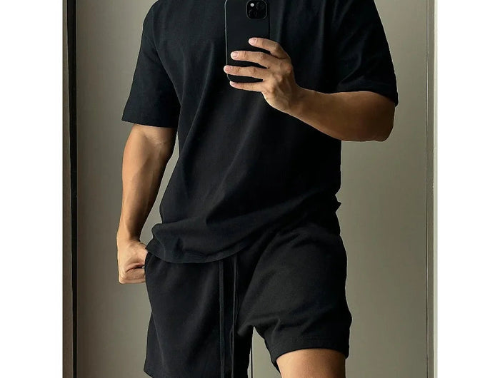 Set di pantaloncini a maniche corte in puro cotone da uomo, t-shirt sportiva e per il tempo libero allentata alla moda europea e americana platinumshop
