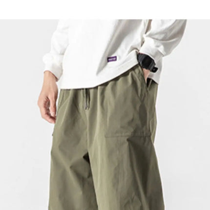 Pantaloni estivi da uomo a gamba larga Pantaloni moda casual solidi leggeri e sottili Harun Pantaloni da jogging larghi da uomo Pantaloni cargo Streetwear Taglie forti 5XL
