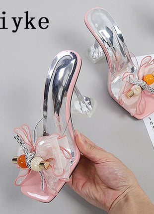 Liyke 2026 Nouvelle Mode 9CM Pantoufles à Talon Transparent Fil Net Rose Nœud Papillon Sandales d'Été Chaussures Transparentes pour Femmes Claquettes Présentations des entreprises productrices de jeux