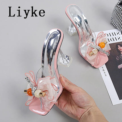 Liyke 2026 Nouvelle Mode 9CM Chaussons à Talon Transparent Filet Rose Nœud Papillon Sandales d'Été Chaussures Transparentes pour Femmes Claquettes Présentations des entreprises de fabrication de jeux