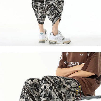 Pantaloncini estivi con stampa da spiaggia, pantaloni casual leggeri e traspiranti, pantaloni larghi alla moda da uomo, pantaloni comodi a lunghezza polpaccio per uomo