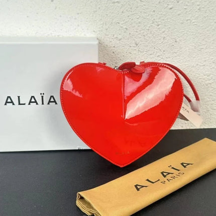 Borsa a tracolla da donna alla moda, a forma di cuore, in vera pelle, morbida e liscia, leggera, casual, per esterni, con scomparti interni.