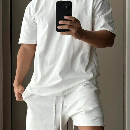 Set di pantaloncini a maniche corte in puro cotone da uomo, t-shirt sportiva e per il tempo libero allentata alla moda europea e americana platinumshop