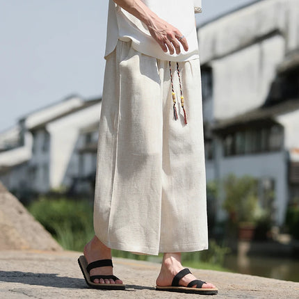 Pantaloncini larghi da uomo Pantaloni casual traspiranti estivi Gamba larga in cotone di lino Taglie forti 5XL Pantaloni Harajuku comodi da esterno da uomo