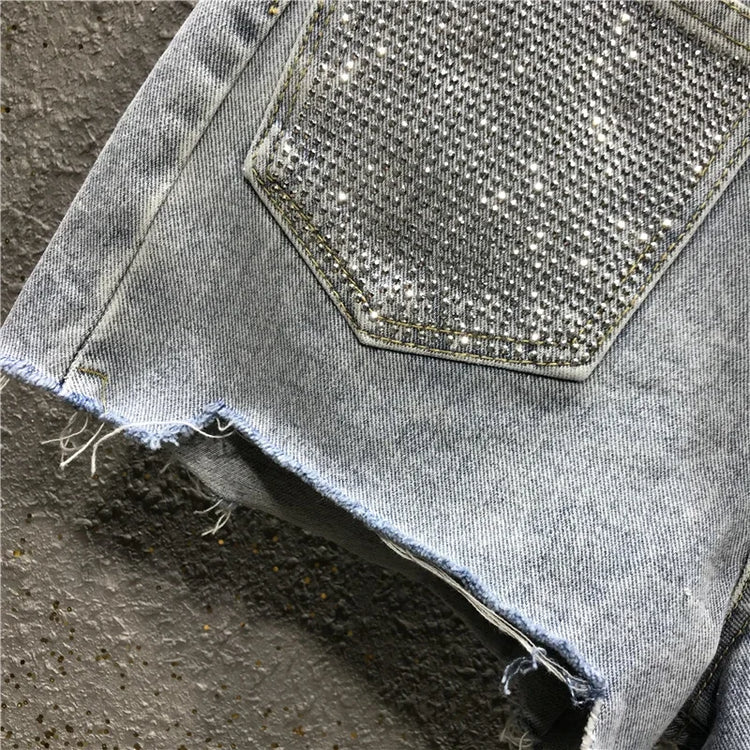Pantaloncini di jeans bianchi blu irregolari strappati con nappe con strass a vita alta da donna estivi Pantaloncini di jeans coreani da donna