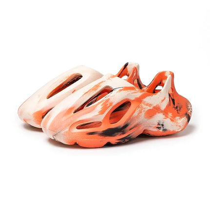 Pantoufles compensées camouflage unisexe Matériau souple EVA Technologie de moulage par injection Chaussures de plage décontractées pour hommes et femmes