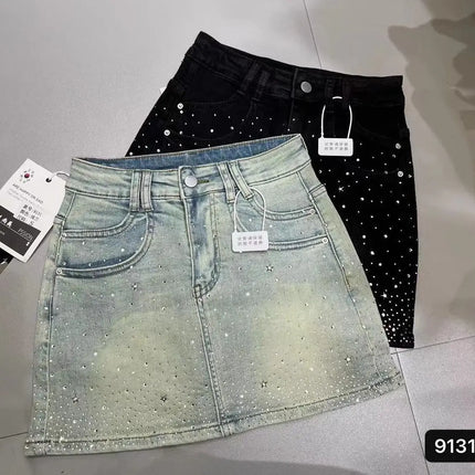 Gonna in denim nera Y2K a trapezio, modello retrò, effetto snellente, con strass a stella, nuova collezione estiva 2026 da donna