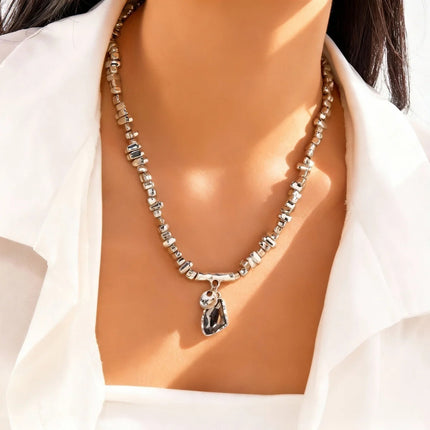 Set di bracciali con collana con pendente in cristallo grigio irregolare semplice barocco Set di gioielli con perline color argento estetico delicato per donna uomo platinumshop