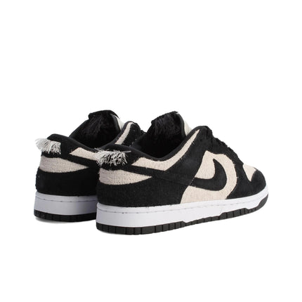 Scarpe da skateboard Nike Dunk da uomo bianche nere IB2990-100