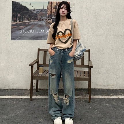 Jeans americani retrò traforati da donna a vita alta con cavallo dritto design sottile allentato High-street Vibe pantaloni trascinanti a gamba larga
