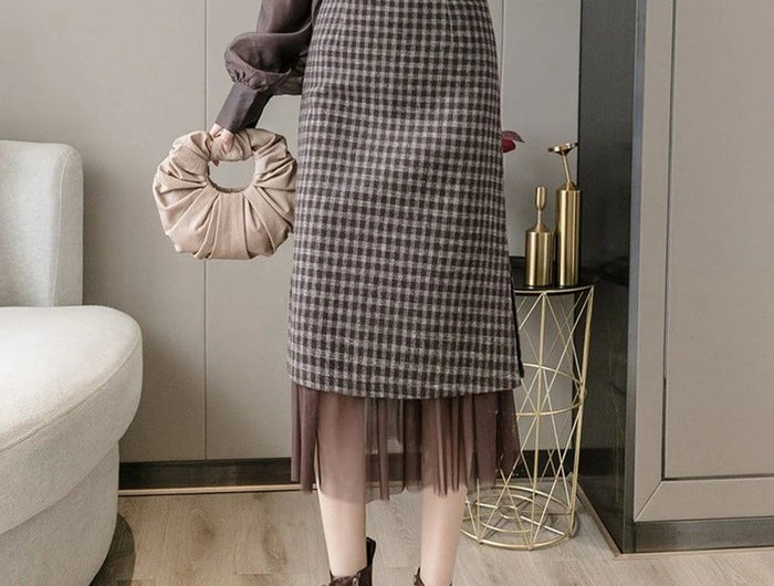 Woolen plaid skirt autumn and winter 2025 new plaid foreign style small man a word hip wrap medium and long skirt PlatiNum