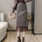 Woolen plaid skirt autumn and winter 2025 new plaid foreign style small man a word hip wrap medium and long skirt PlatiNum