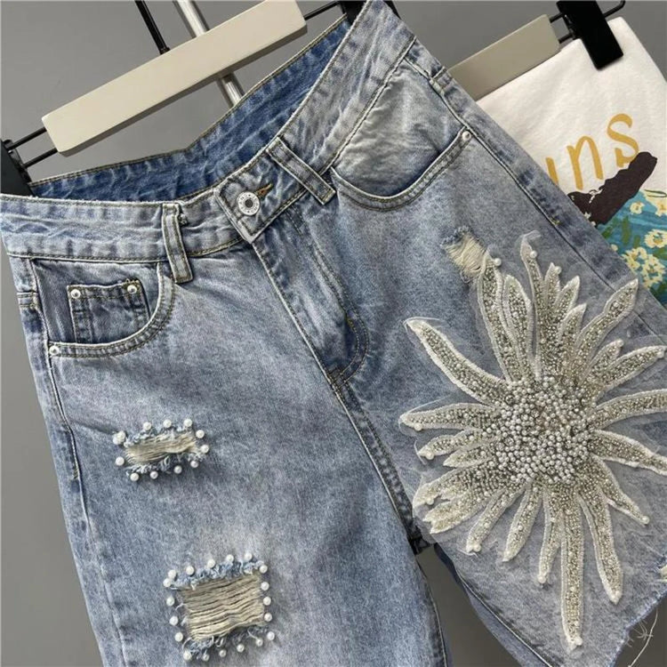 Pantaloncini di jeans con foro sfilacciato floreale con perline alla moda Pantaloncini casual estivi da donna a vita alta in tinta unita stile coreano