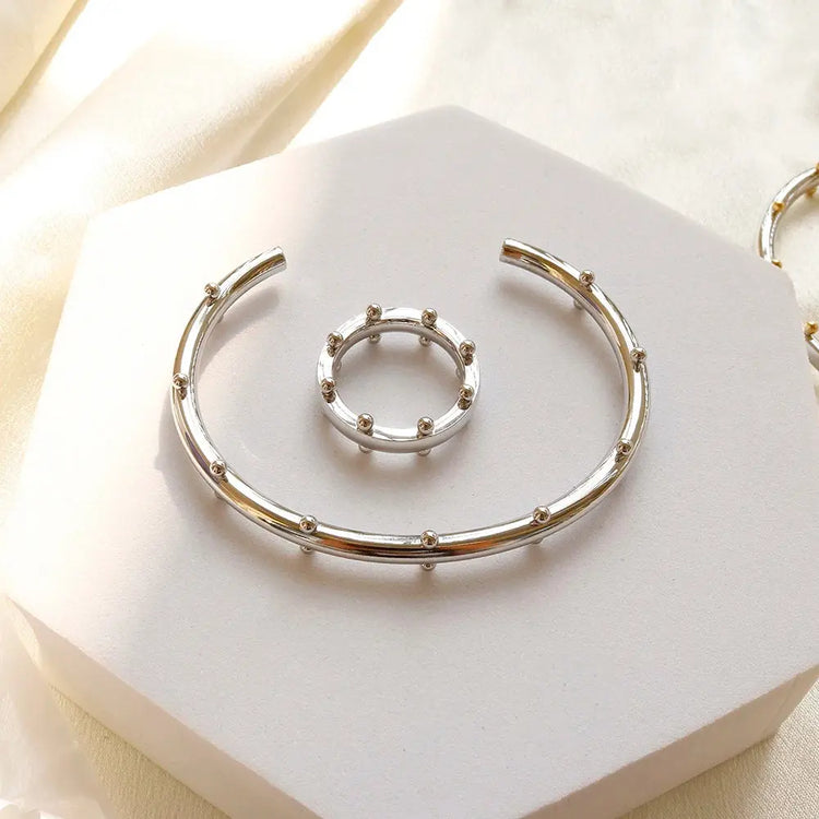 Set di gioielli di lusso Bracciale rigido in acciaio inossidabile Anello da dito Orecchini a cerchio con mini sfere per regali di gioielli di moda da donna platinumshop