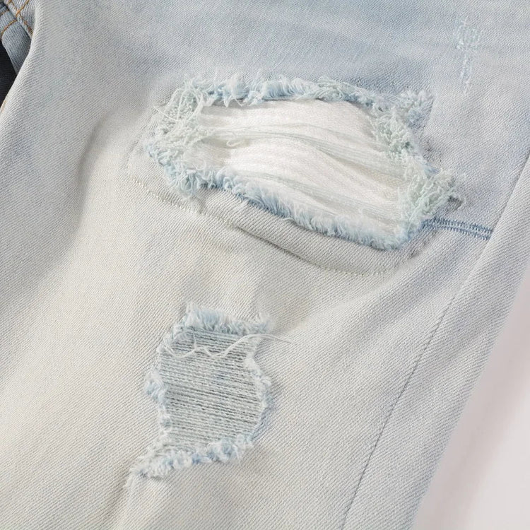 Men Pale Light Blue Biker Jeans Cracked Pleated Patch Patchwork Stretch Denim Pants Streetwear Holes Ripped Skinny Trousers PlatiNum