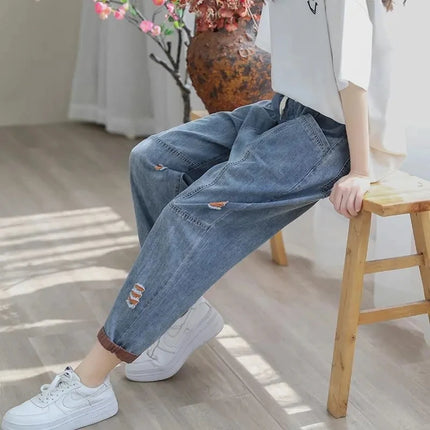 Jeans Strappati a Nove Punti da Donna, Nuovi Pantaloni Harem Casual Sottili con Vita Elastica, Lunghi alla Caviglia, in Denim, per l'Estate 2026