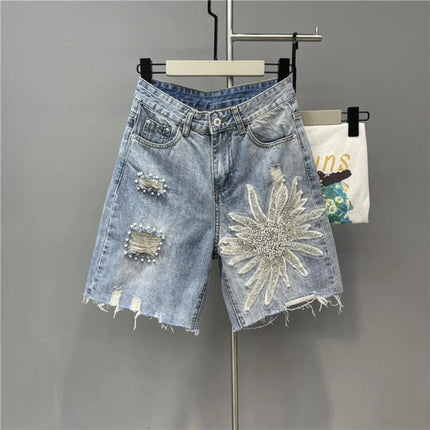Pantaloncini di jeans con foro sfilacciato floreale con perline alla moda Pantaloncini casual estivi da donna a vita alta in tinta unita stile coreano