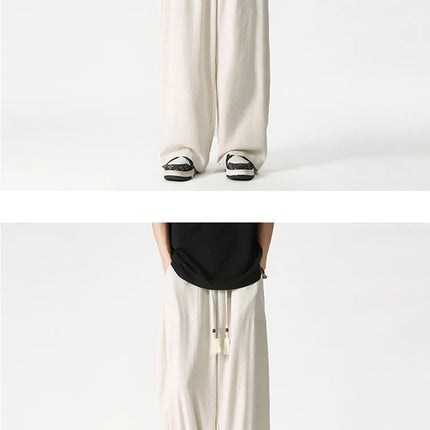 Nuovi pantaloni da uomo Casual comodi pantaloni a gamba larga pantaloni Harun larghi alla moda pantaloni sportivi con coulisse lanterna da uomo taglie forti