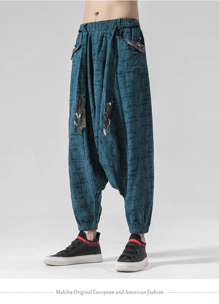 Pantaloni a gamba larga da uomo in cotone e lino casual oversize Harajuku pantaloni alla moda da uomo samurai giapponese retrò Ukiyo-e stampa pantaloni con cintura da uomo