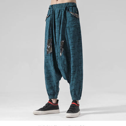 Pantaloni a gamba larga da uomo in cotone e lino casual oversize Harajuku pantaloni alla moda da uomo samurai giapponese retrò Ukiyo-e stampa pantaloni con cintura da uomo