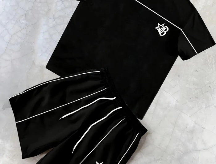 Set di pantaloncini T-shirt girocollo comodo e traspirante con stampa a righe estiva da uomo nuova di vendita calda adatto per strada all'aperto platinumshop