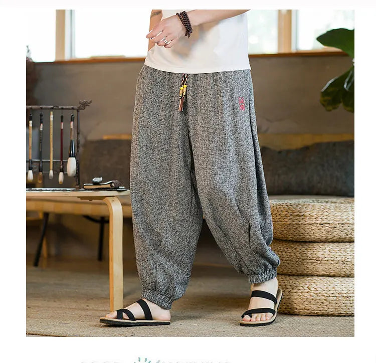 Pantaloni da jogging in seta di ghiaccio da uomo pantaloni casual stile Harajuku cinese da uomo pantaloni sportivi Harlem allentati ricamati streetwear 5XL