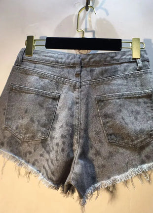 2025 Abiti estivi, Nuovi pantaloncini di jeans con bordo ruvido indossato a vita alta con perforazio