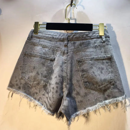 2025 Abiti estivi, Nuovi pantaloncini di jeans con bordo ruvido indossato a vita alta con perforazione a caldo per l'industria pesante, pantaloni caldi da donna