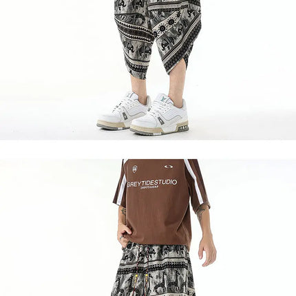 Pantaloncini estivi con stampa da spiaggia, pantaloni casual leggeri e traspiranti, pantaloni larghi alla moda da uomo, pantaloni comodi a lunghezza polpaccio per uomo