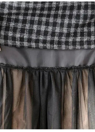 Woolen plaid skirt autumn and winter 2025 new plaid foreign style small man a word hip wrap medium and long skirt PlatiNum