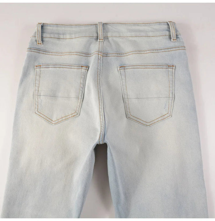 Men Pale Light Blue Biker Jeans Cracked Pleated Patch Patchwork Stretch Denim Pants Streetwear Holes Ripped Skinny Trousers PlatiNum