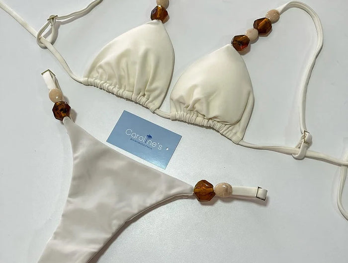 Costumi da bagno solidi Sexy Halter Triangolo Bead String Bikini 2026 Nuovo Mini Micro Perizoma Costume da bagno Donna Estate Bikini brasiliani Set